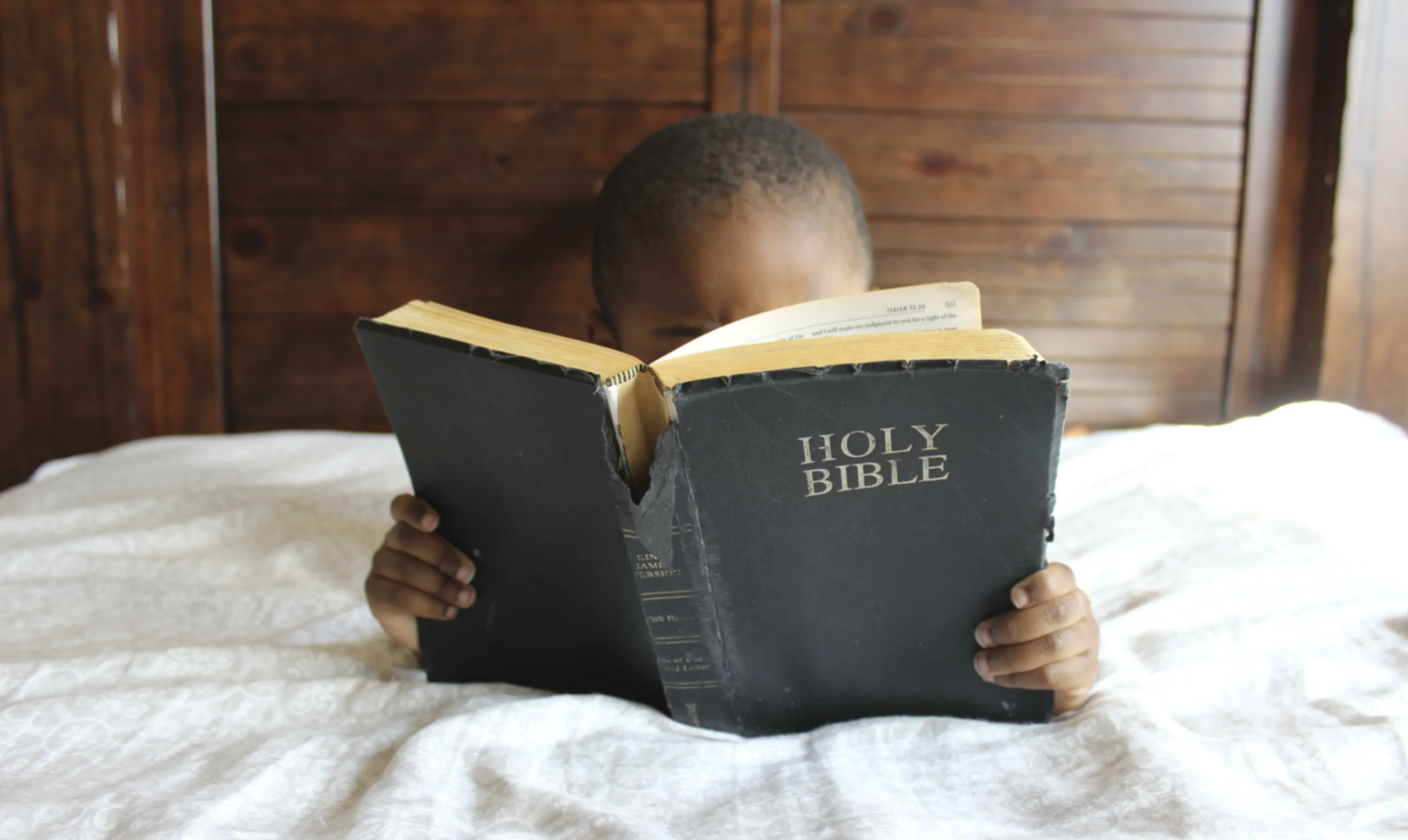 Child Reading the Bible