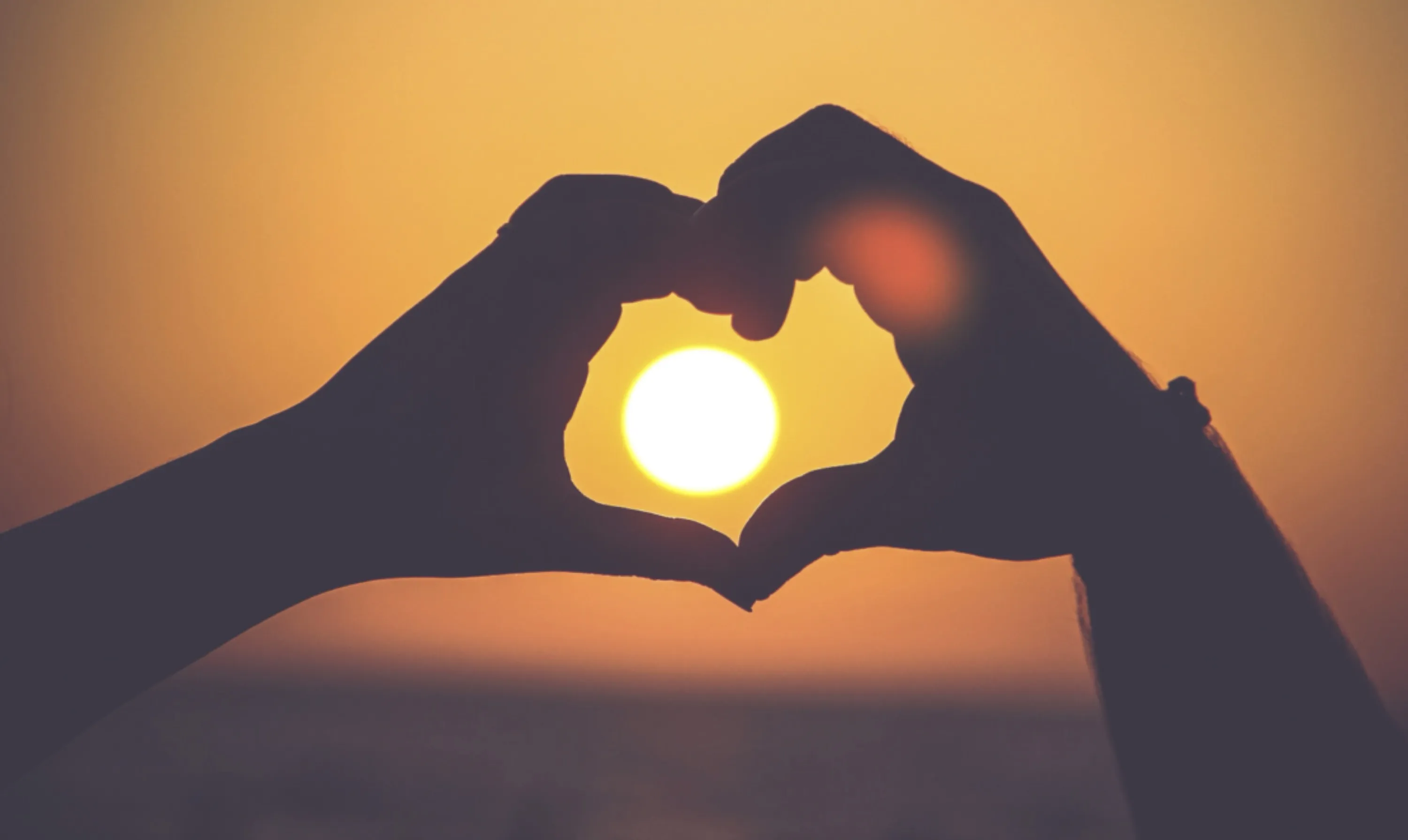Sun Framed By Hands