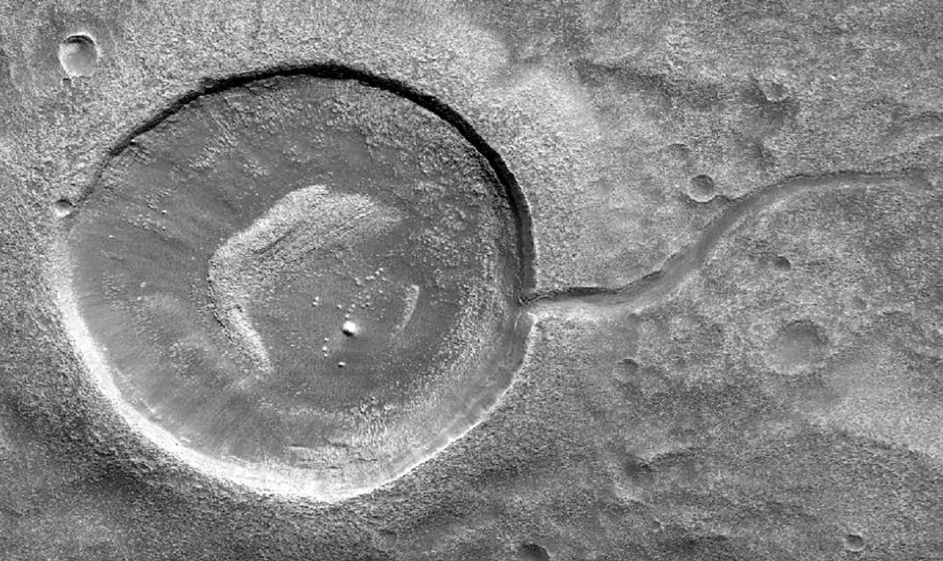 Crater “Tadpoles” on Mars